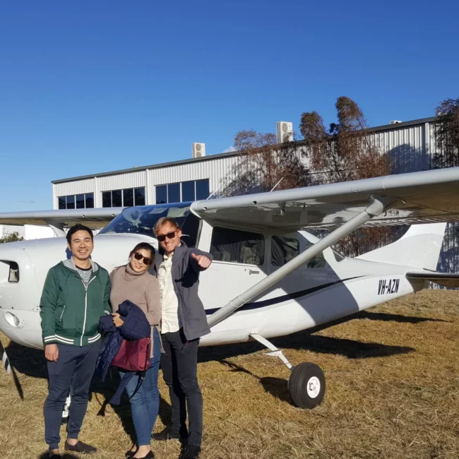 Fly Australia - Reef and Island scenic flight with happy customer